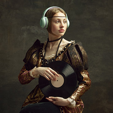 A medieval woman stiffly poses for a painting while wearing headphones and holding a record