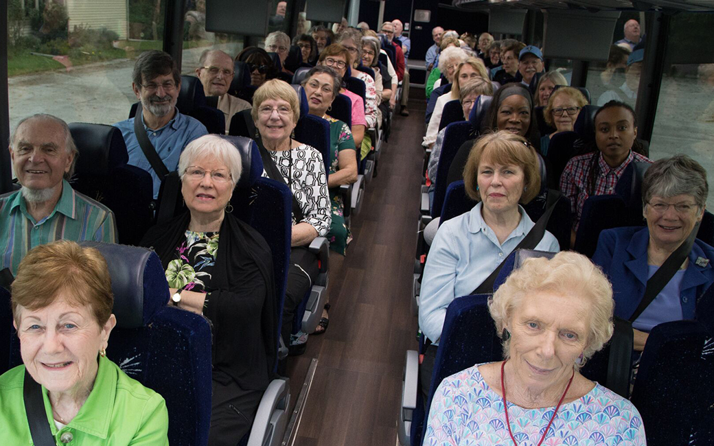 osher members in a shuttle bus on a day trip