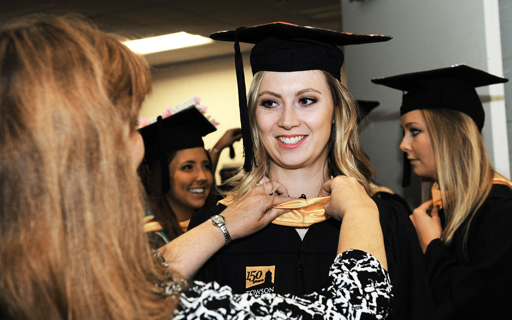 Alumni and staff volunteers are the hidden helping hand for graduates before, during and after the ceremony.