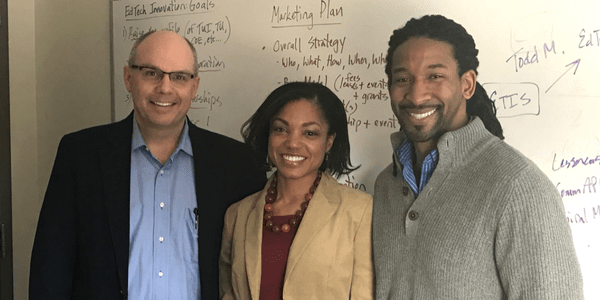 Towson University's Director of Entrepreneurship Frank Bonsal (left), poses with Nicole Tucker-Smith and Khalid Smith, founders of the company Lessoncast. 