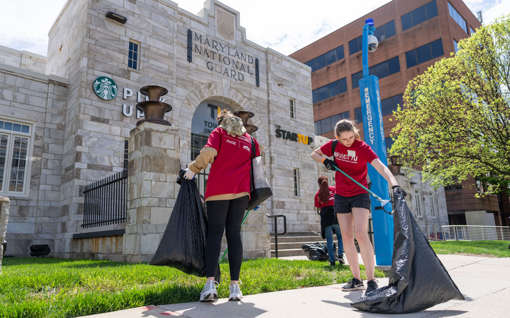 Students pick up litter outside of TU's StarTUp