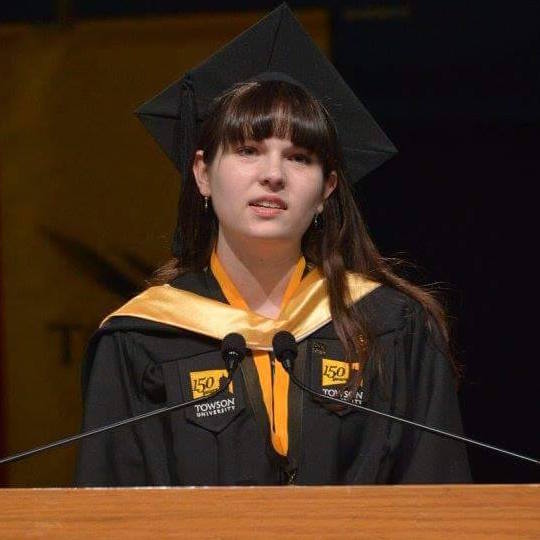 Lily McFeeters at the podium speaking at Commencement 2016
