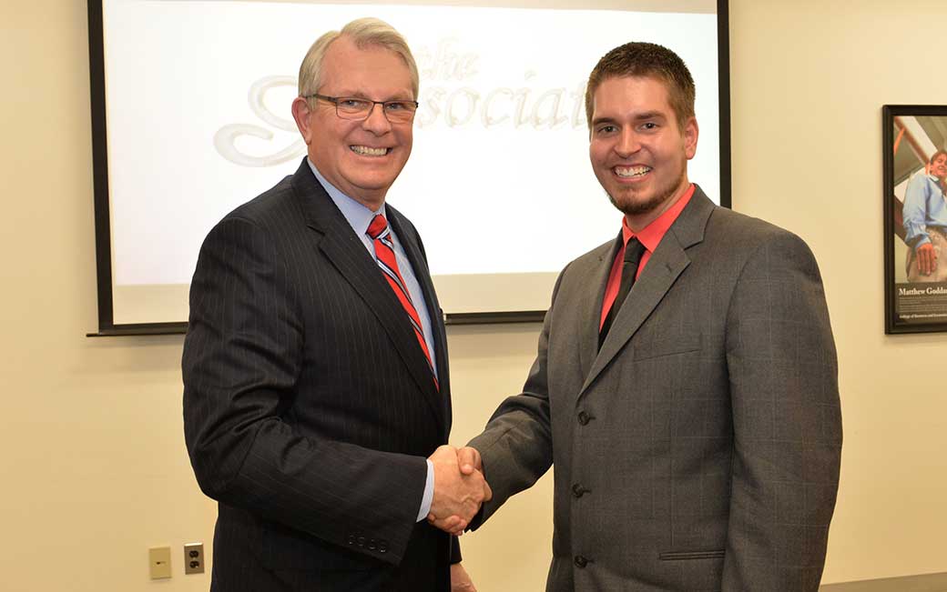 SECU President and CEO Rod Staatz with 2014 "The Associate" winner Thomas Slemp.