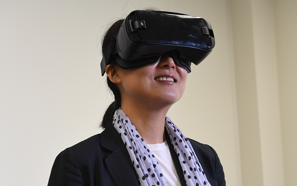 Faculty with virtual reality headset