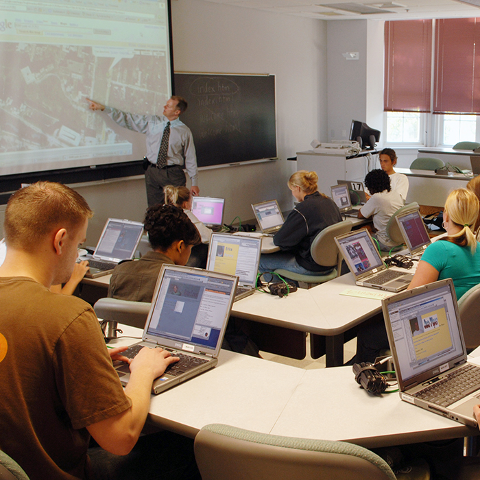 faculty teaching computer class