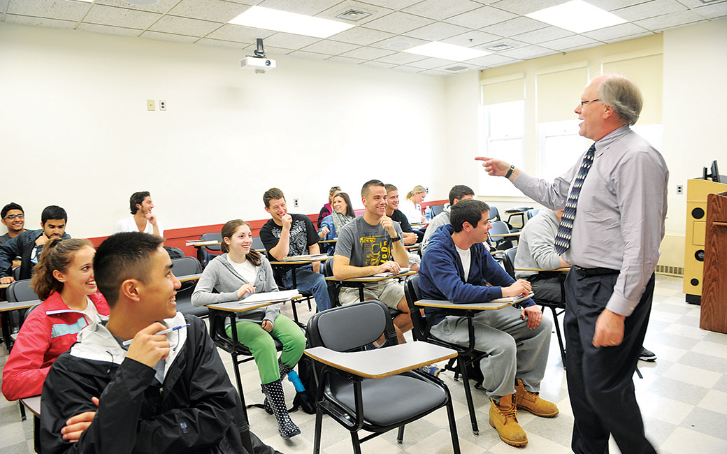 Image of Towson University classroom with faculty and students