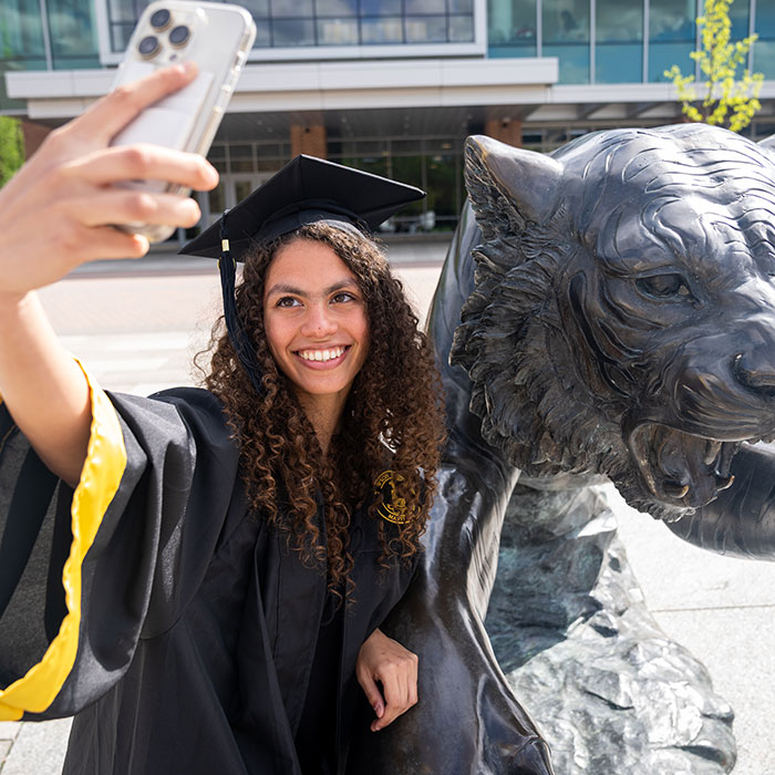 graduate taking selfie