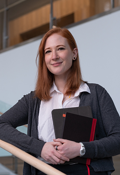 Graduate student with books