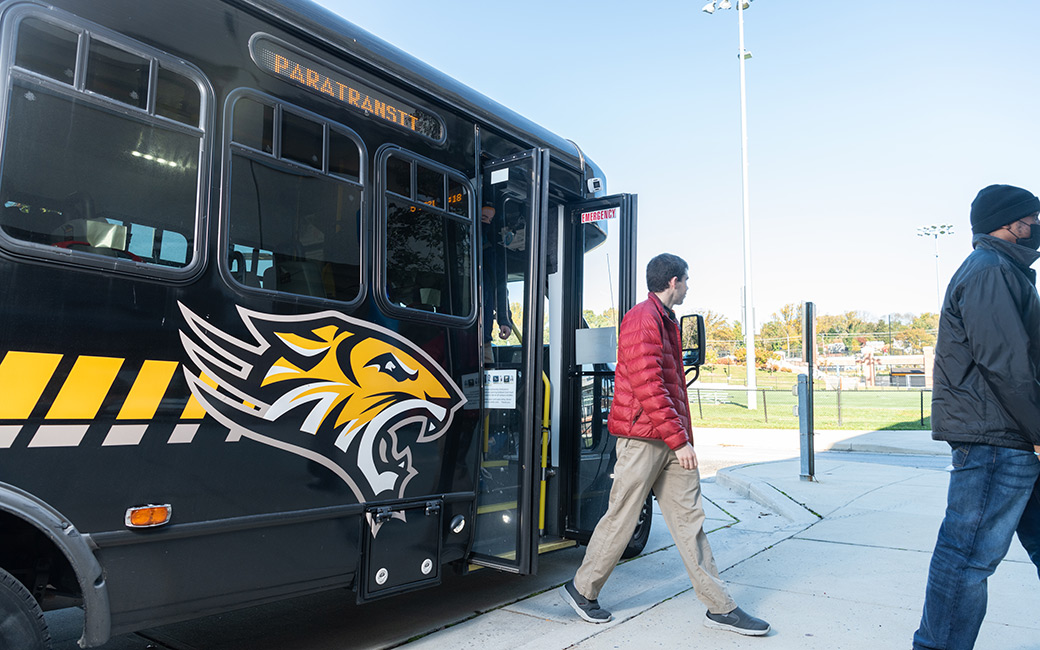 Students exiting the paratransit shuttle