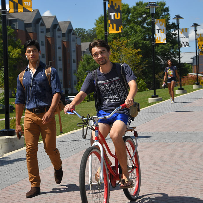 Student biking on Campus 