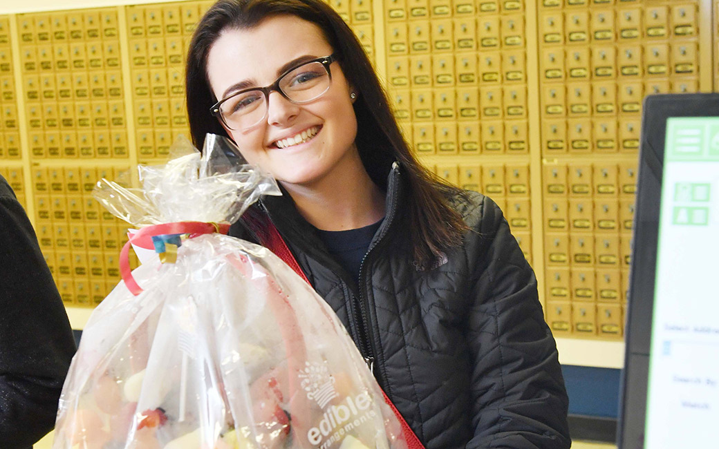 Student receives delivery from post office
