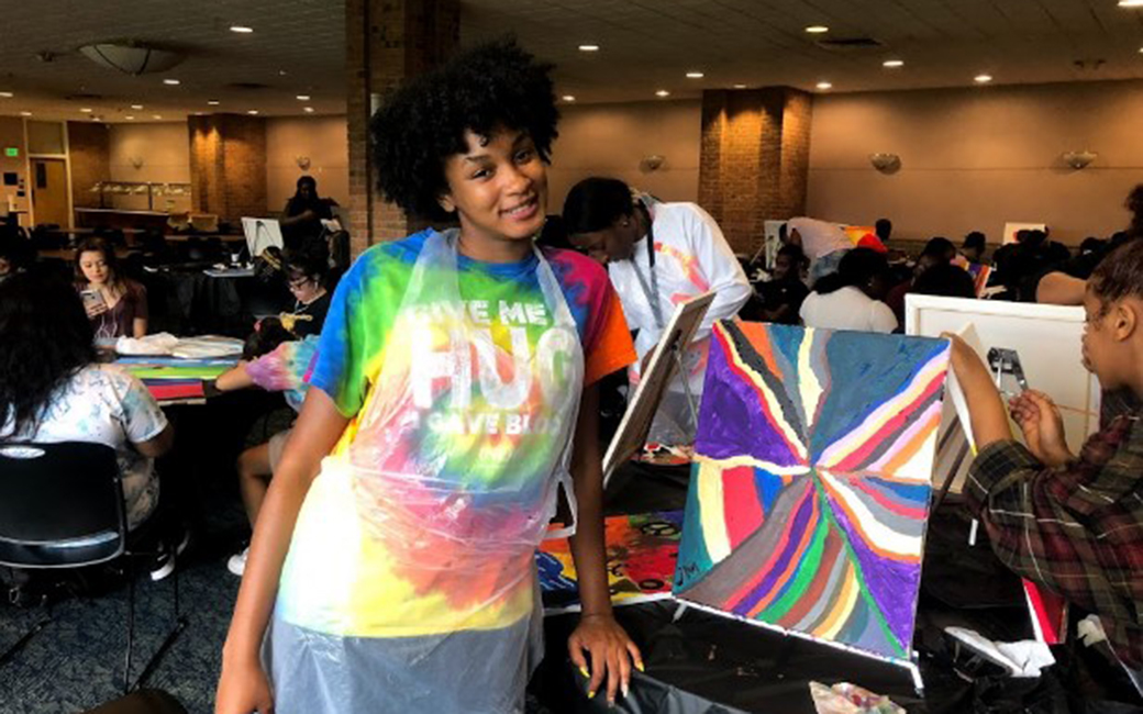 student at a painting event