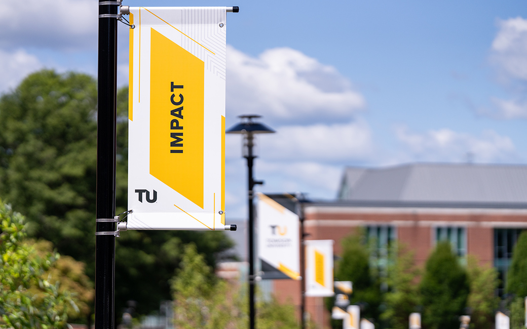 Impact banner on TU campus