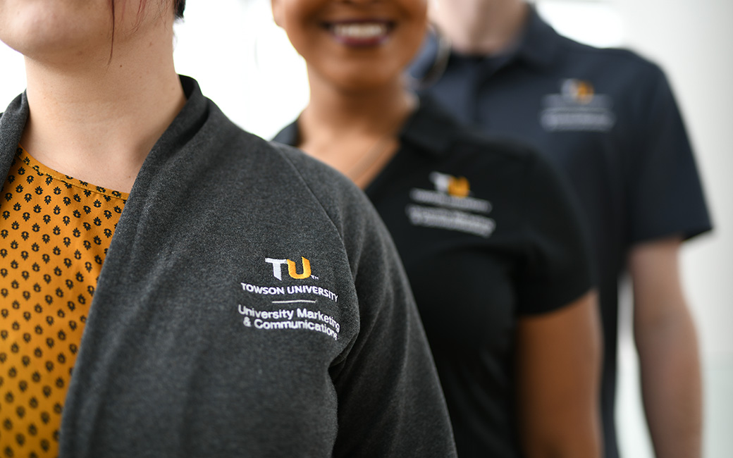 TU employees wearing TU branded clothing
