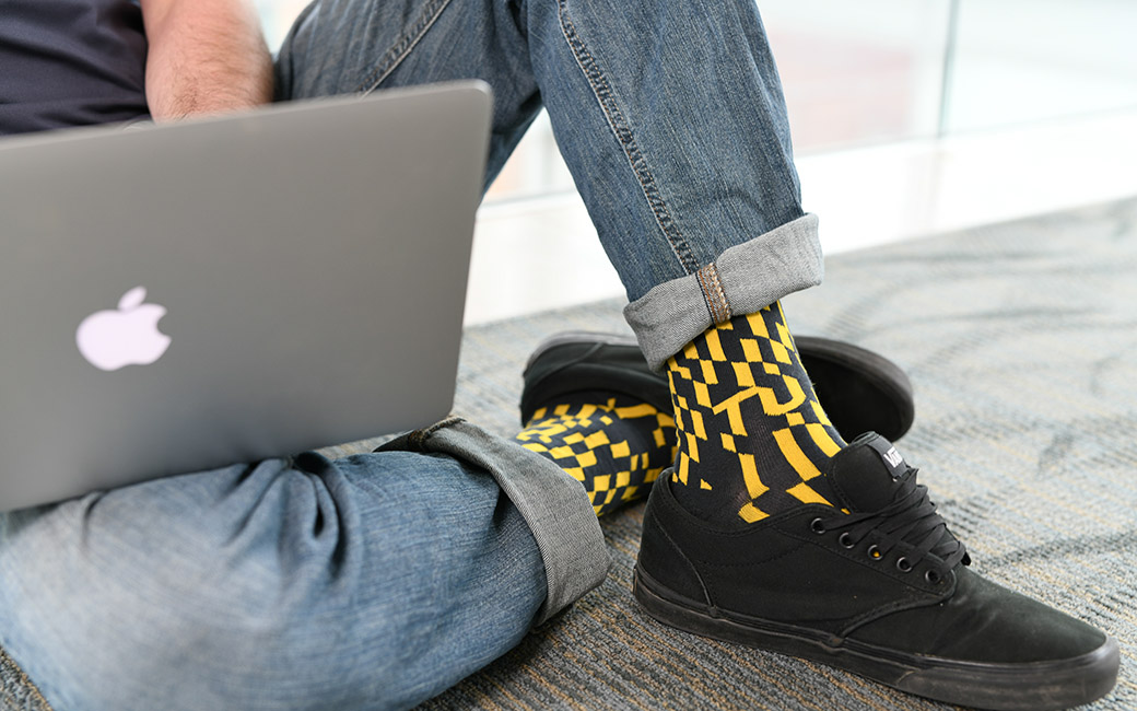 TU student wearing tigertooth pattern socks