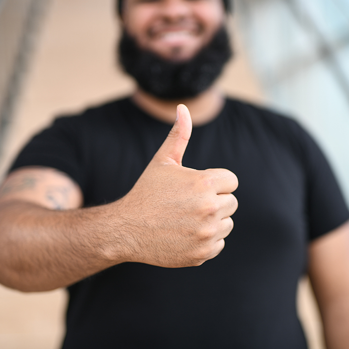 TU student showing a thumbs up