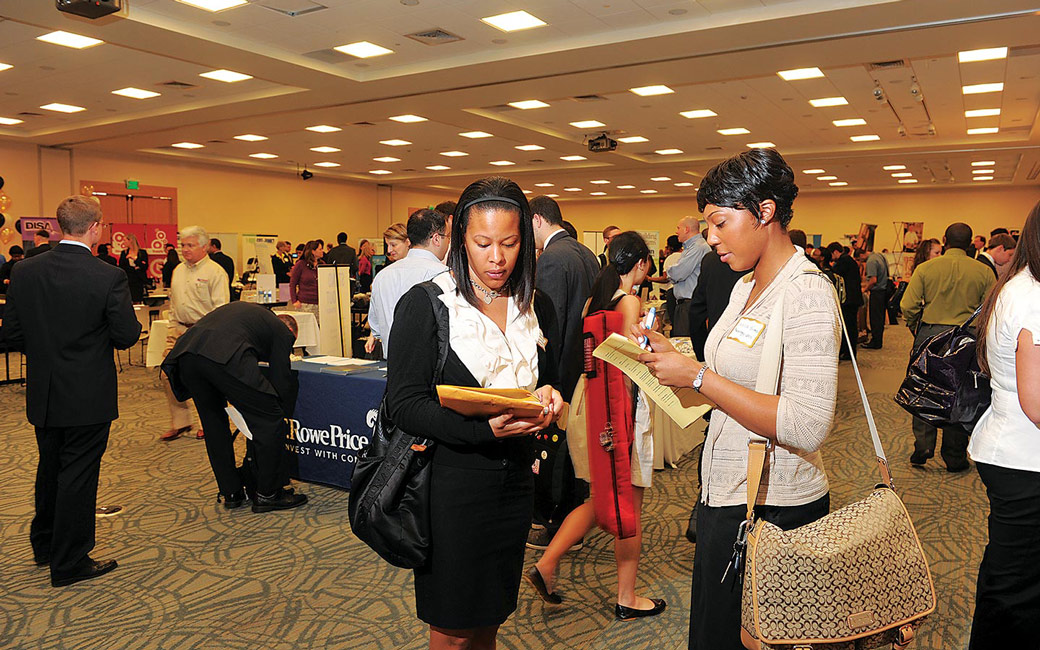Two students reviewing information at Career Fair