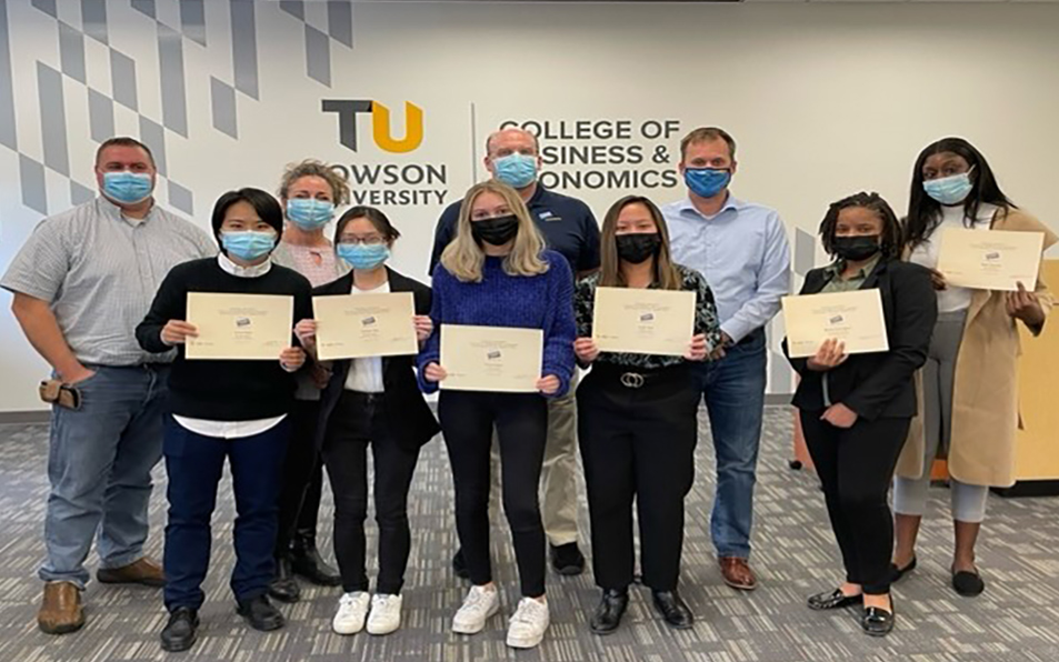 Students pose with certificates from the 2021 Data Analytics Competition