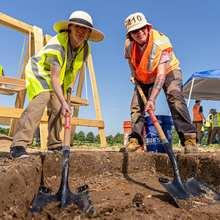 Students excavating a dig site