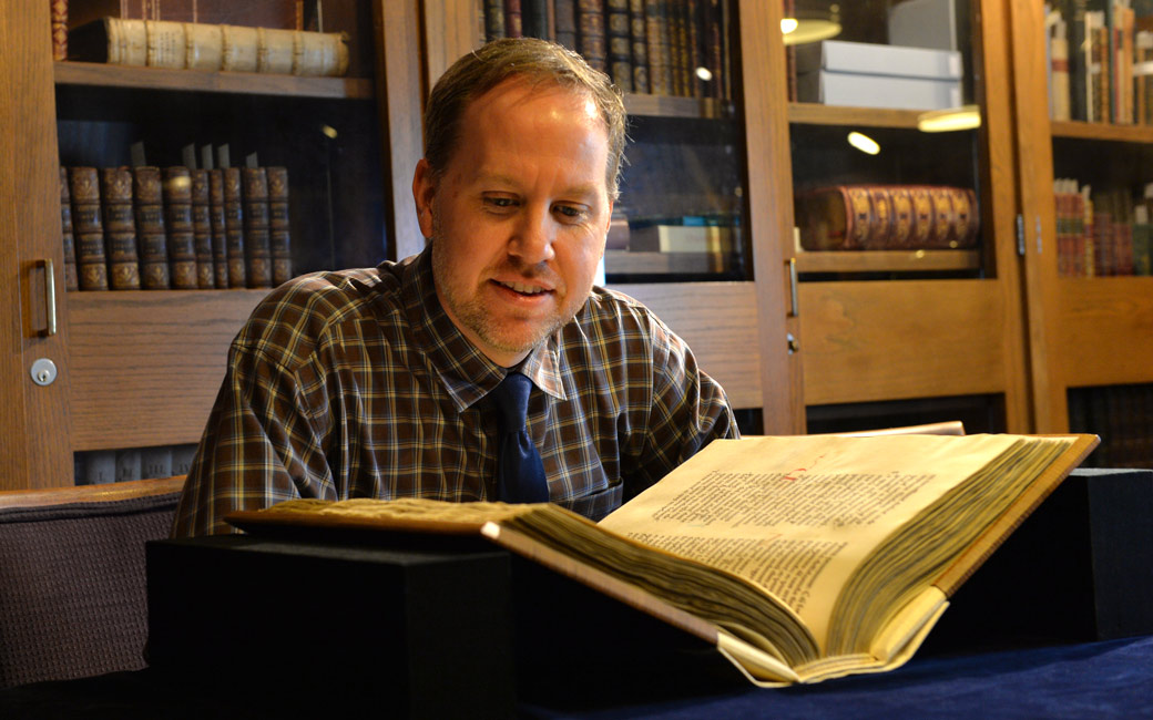 Professor Cain reviews a manuscript at the Walters Art Museum