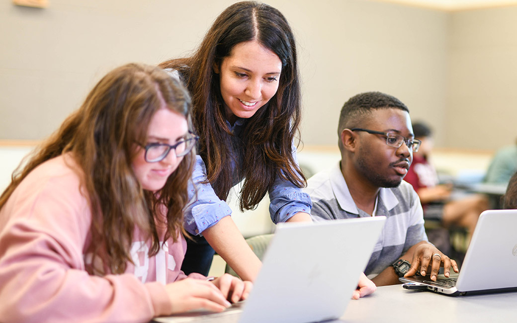Jeannie Vanasco and two students