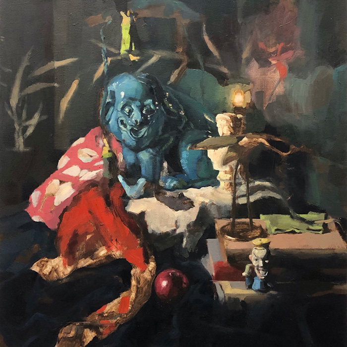 painting student work depicting a still life of objects including a clown face