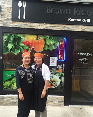 Heather Chung, right, and her sister Unmi Kim