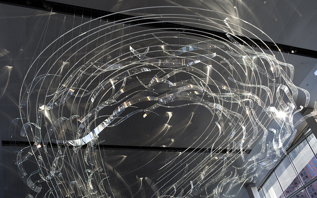 Close up of a glass, steel, wire, milled polycarbonate sculpture, titled Seagrass.