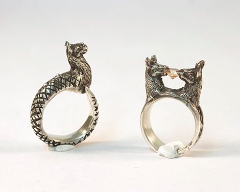 two silver dragon rings
