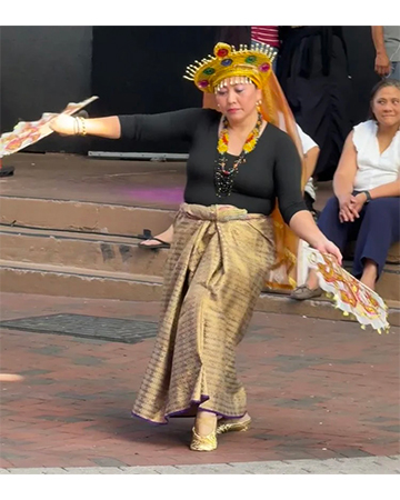 Performing a traditional fan dance