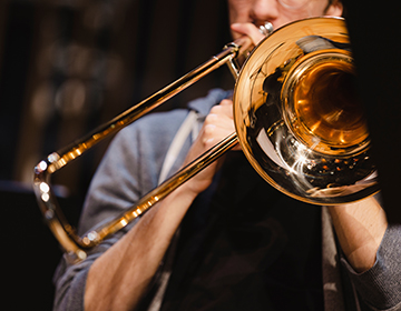 Close up on a trombonist