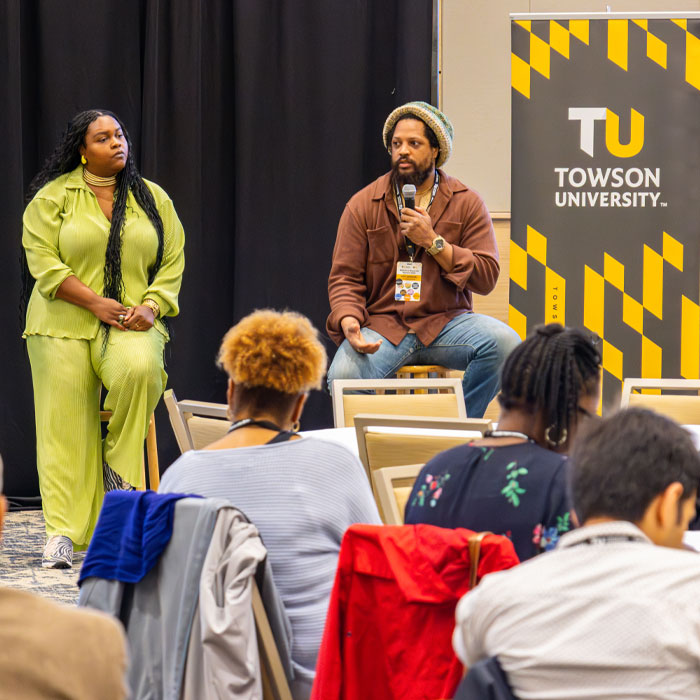 speakers on stage at nonprofit summit