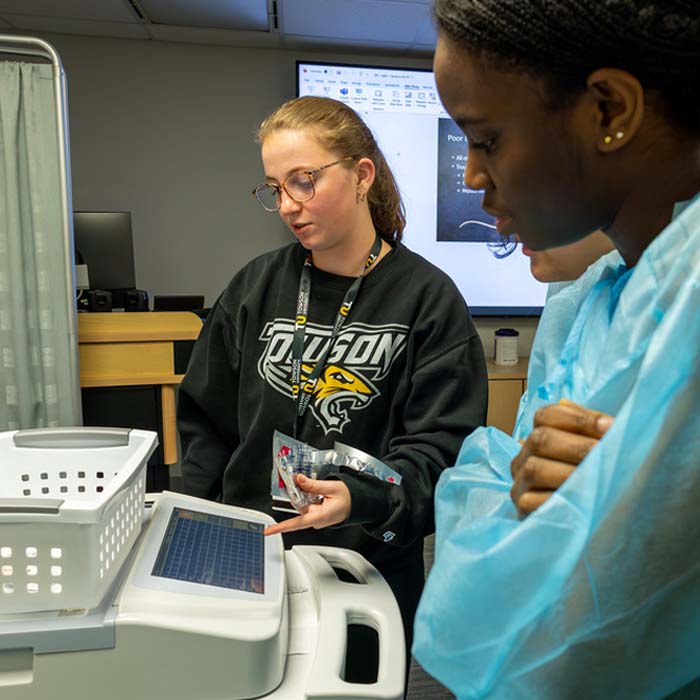 TU students using the ekg machine