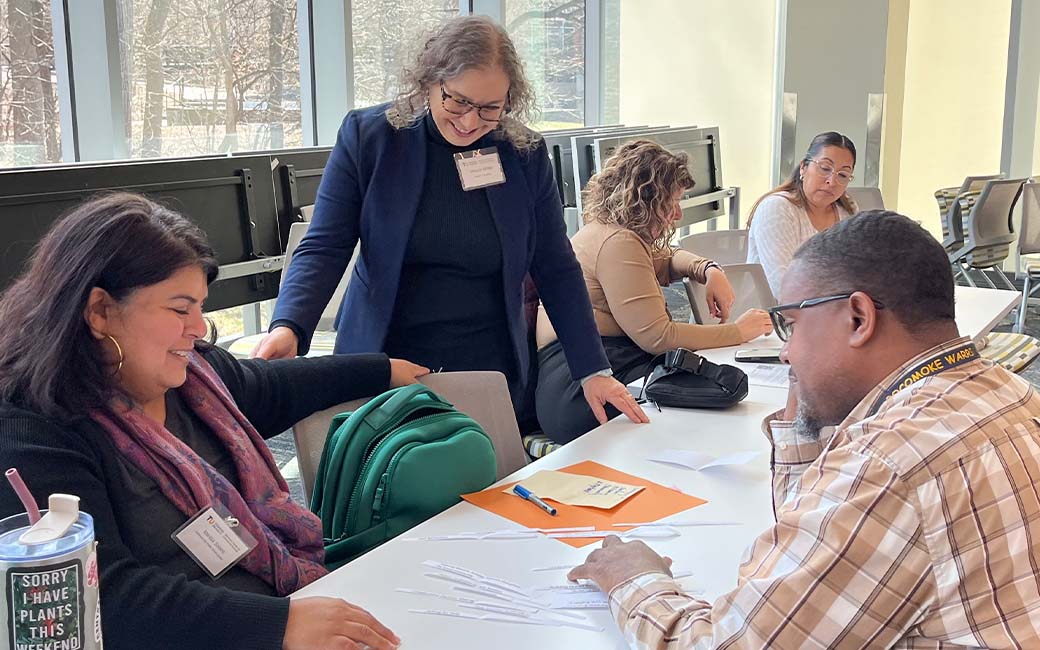 jessica shiller working with community school leaders at conference