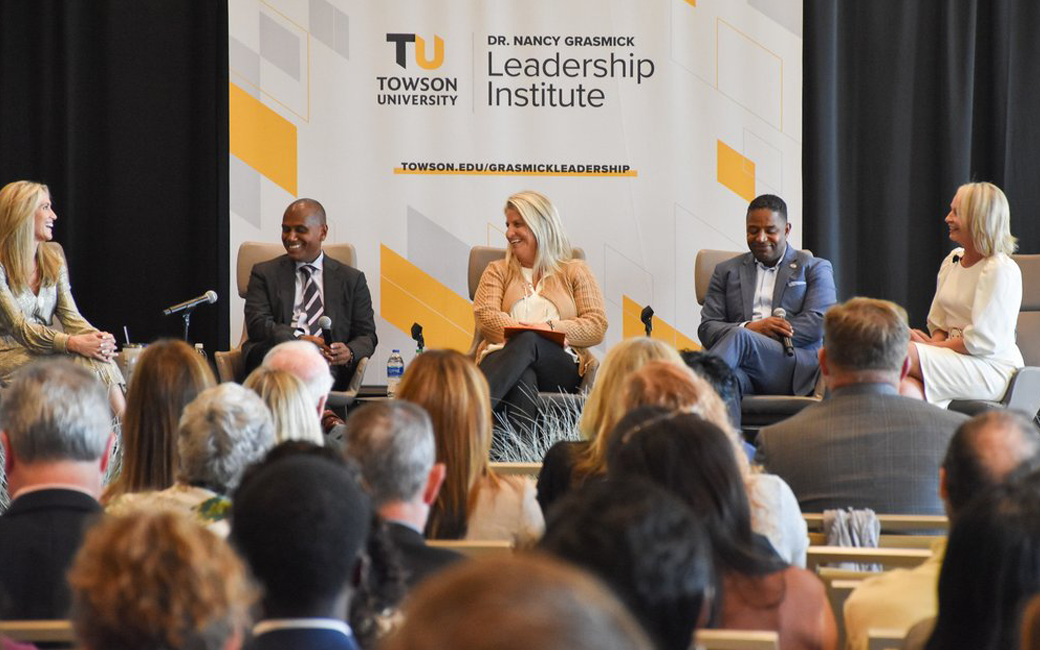 business leaders on stage