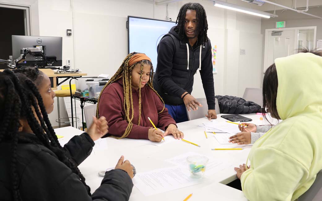 Students completing a team project