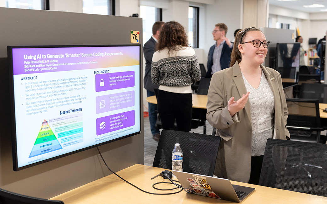 TU researcher presenting at a symposium
