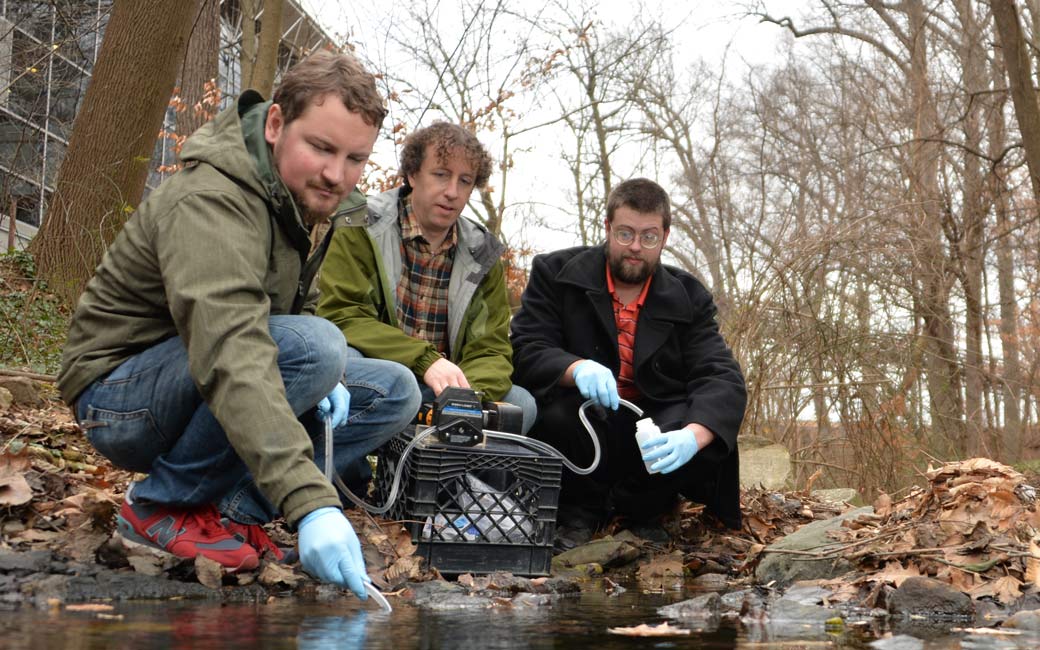 Prof. Moore and students testing at stream