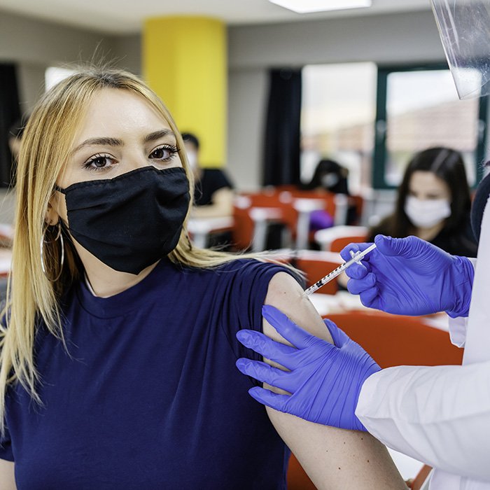 Student getting flu shot at the Health Center