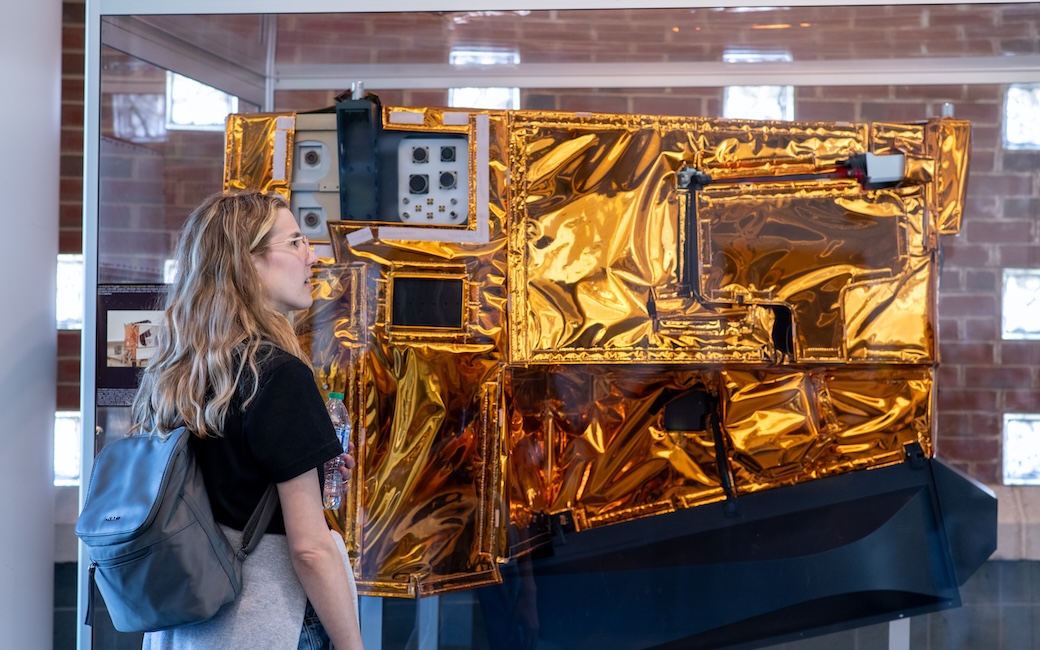 TU students stand in one of NASA Goddard's facilities