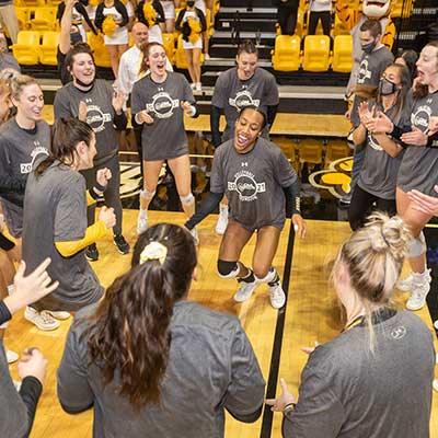 volleyball team celebrates win