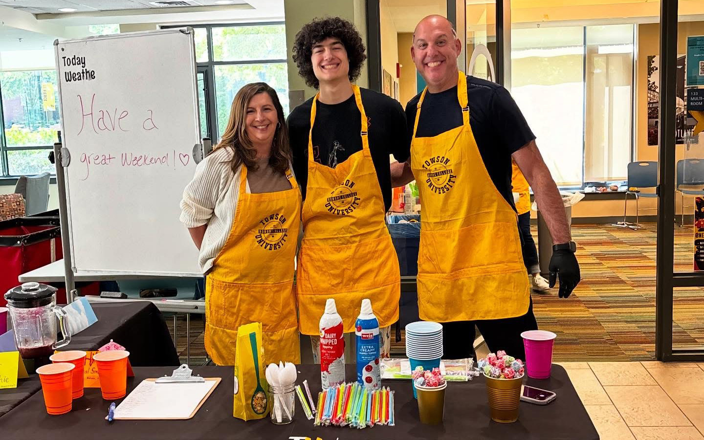 Hoffman Family ready to serve smoothies at Smoothie Saturday
