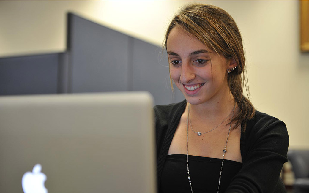 student working on computer