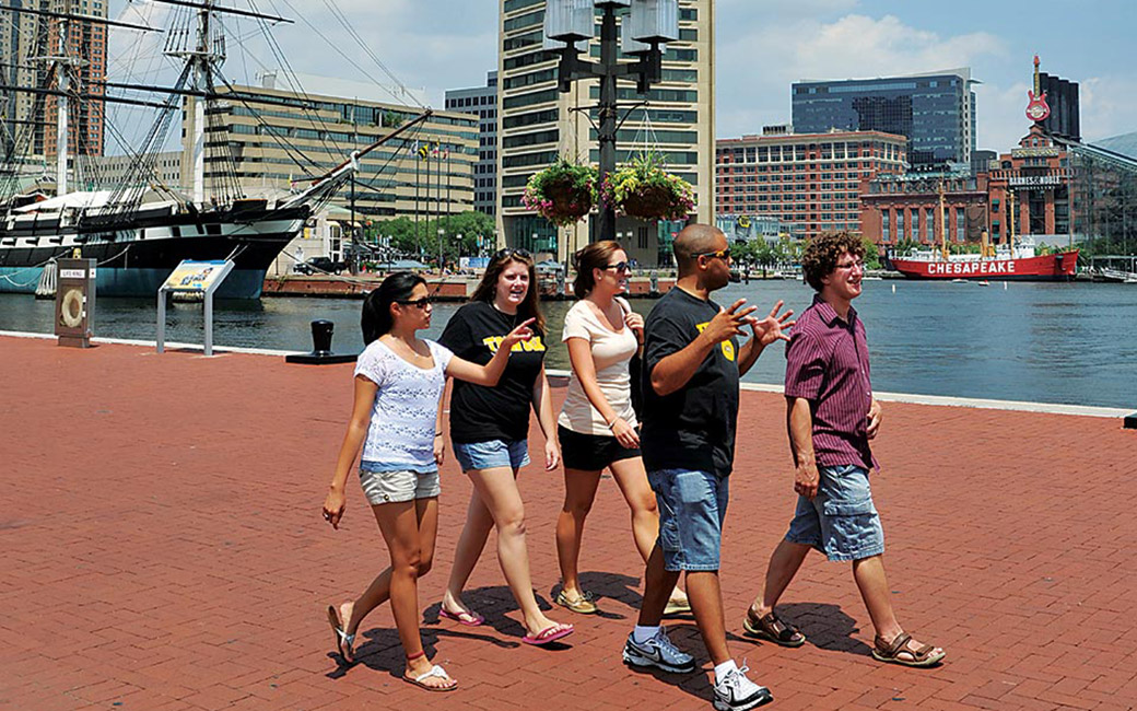 students at baltimore inner harbor