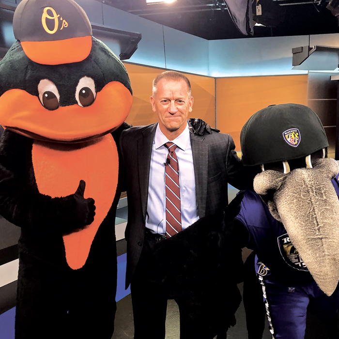 Keith Mills with the Orioles and Ravens mascot