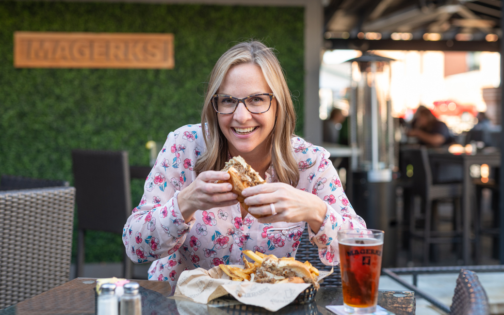 Bridget Lloyd eating a cheesesteak