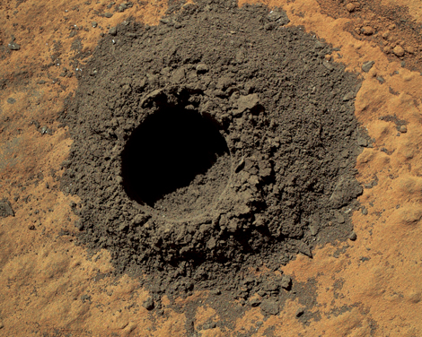 Close-up photo of a drill hole taken on Mars