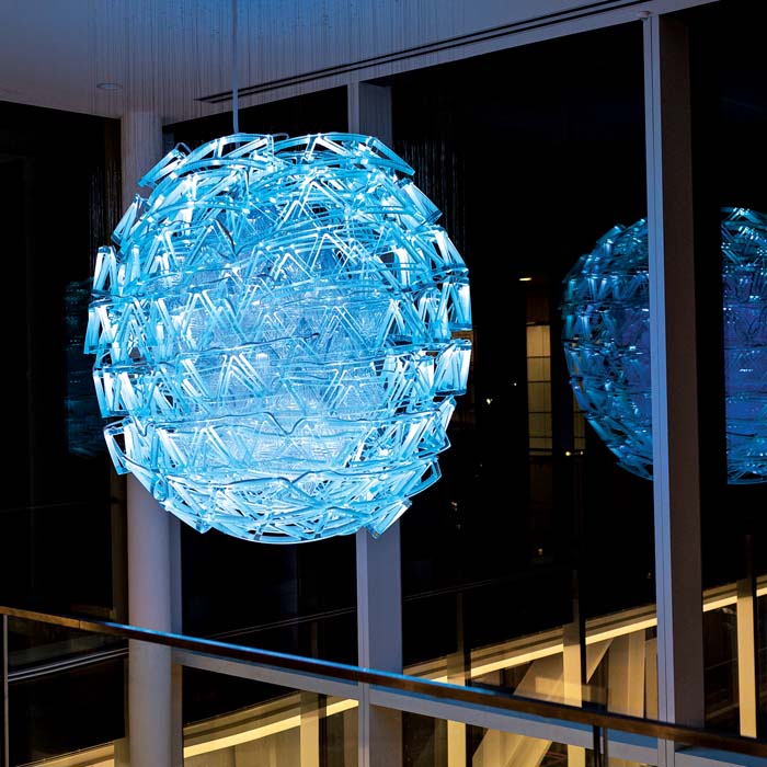 blue-light-filled glass art installation