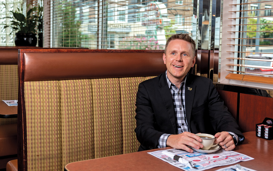 Steve Eigenbrot in a booth at the Towson Diner