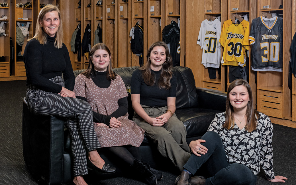 The Beernink family in the men's lacrosse locker room